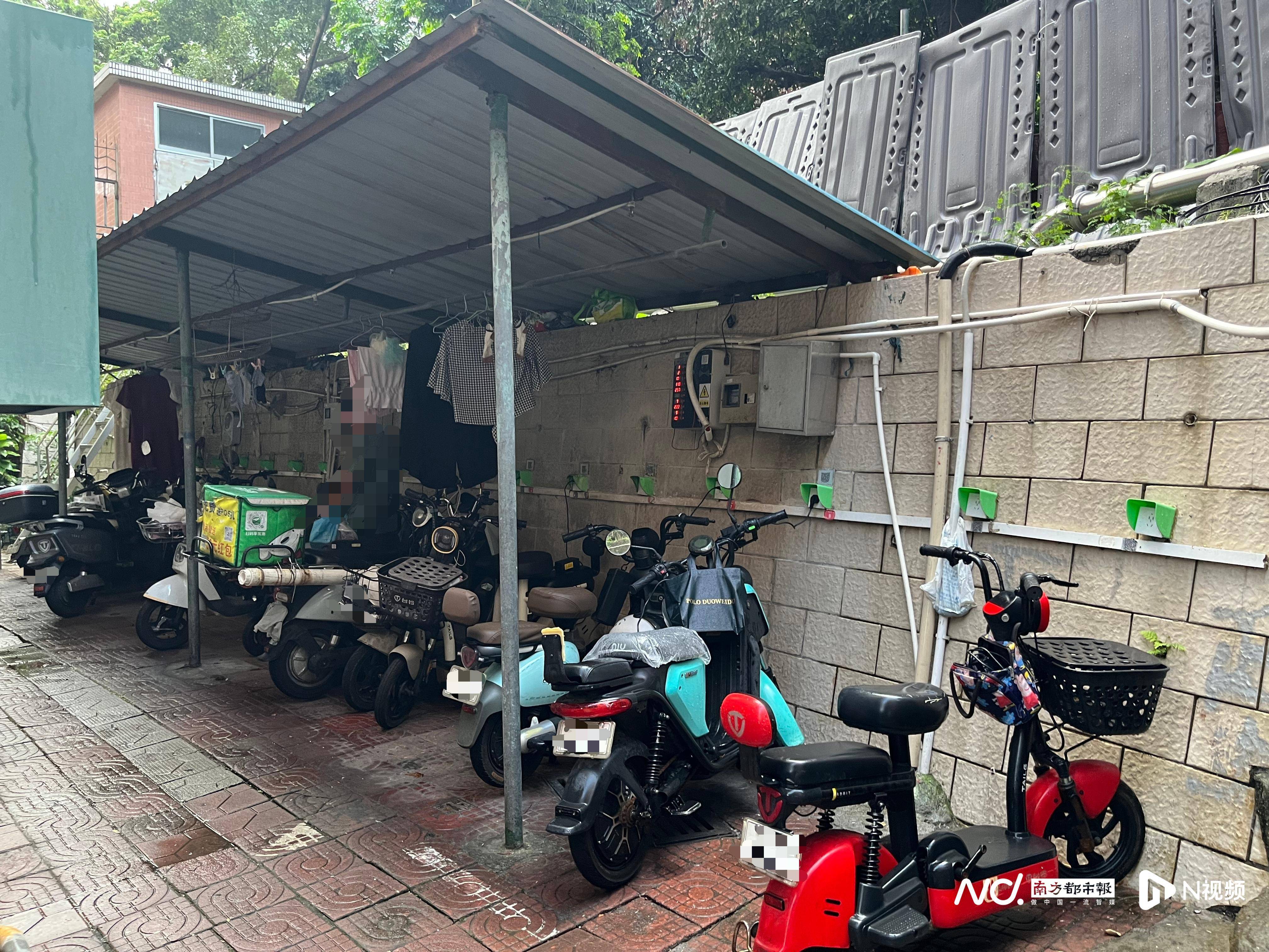 深圳一小区电动车管理引担忧<strong></p>
<p>比特儿下载</strong>，部门责令整改后，记者实探
